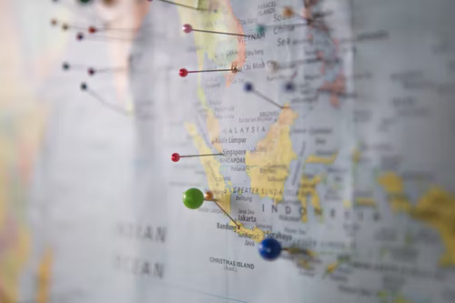 World map with pins representing how global audiences influence the best times to post on TikTok.