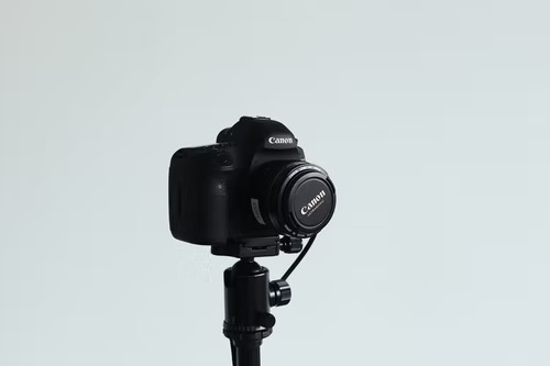Black DSLR camera representing a top TikTok influencer’s creative freedom. 