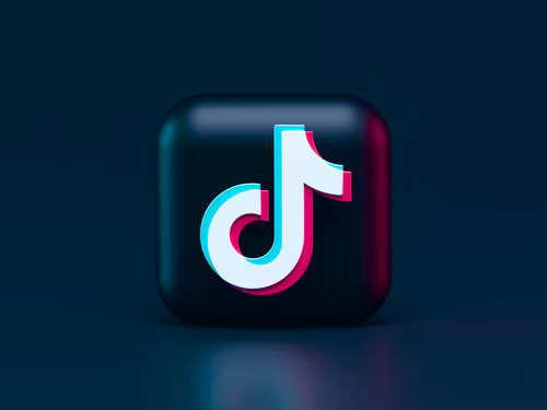 Black 3D square with white TikTok logo. 