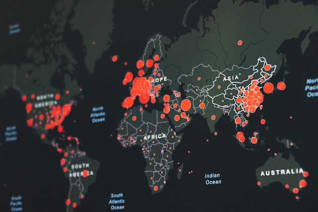 Map of the world with red dots.