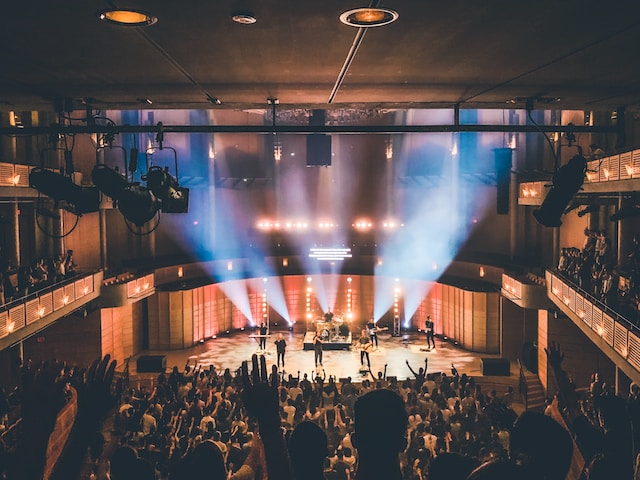 A big audience watching a live performance. 