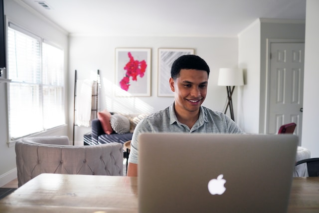 A man working on his laptop. 