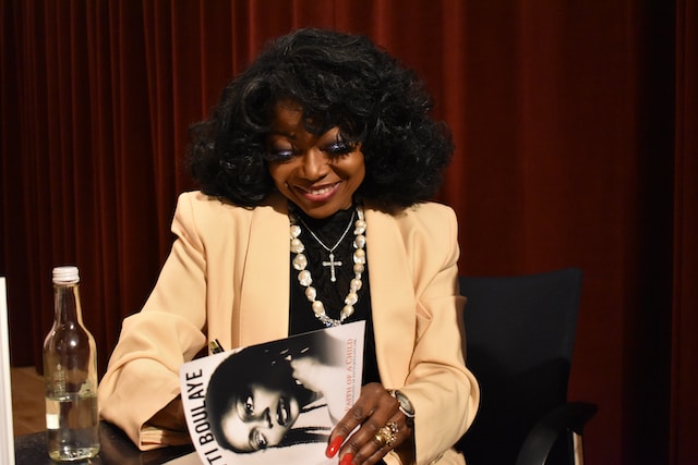 An author signing her book. 