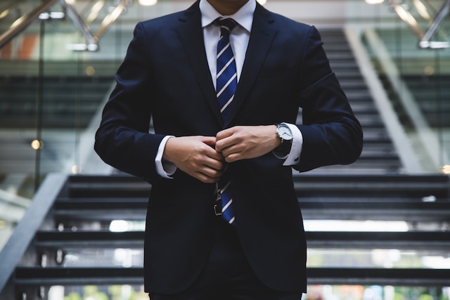 A man wearing a suit. 