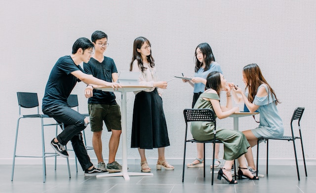 A group of people engaged in lively conversation.