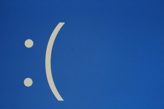 A sad face emoji on a blue background.