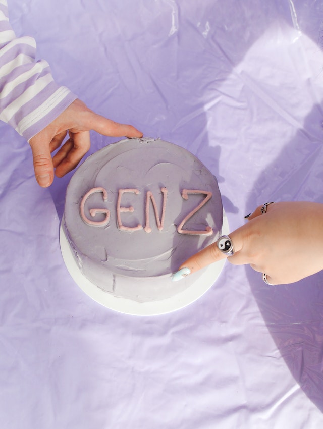 The Gen Z aesthetic on a purple cake for TikTok.