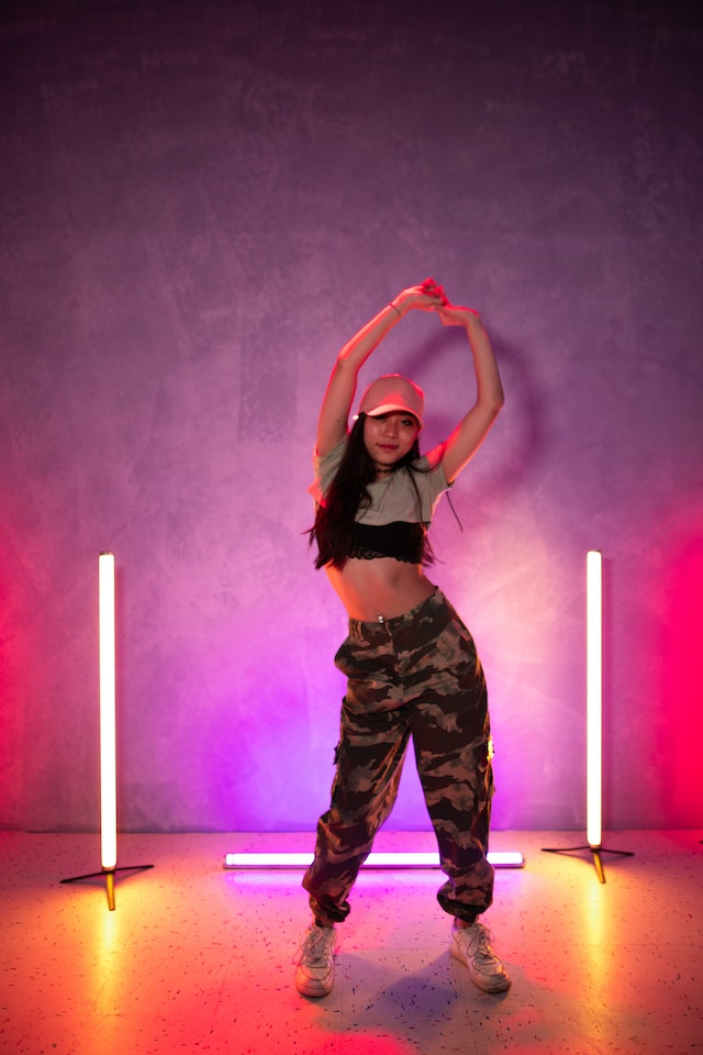 A girl dancing for a TikTok video. 