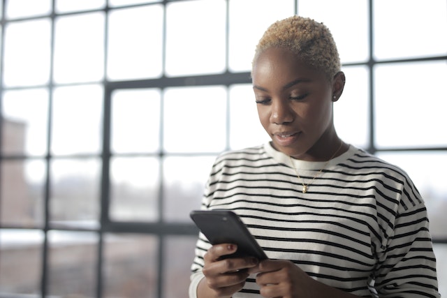 A TikTok influencer opening a second account on her phone.