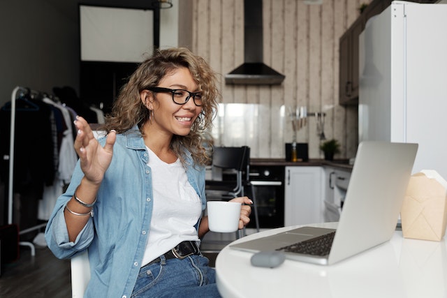 A TikTok influencer having a Live session on her laptop.