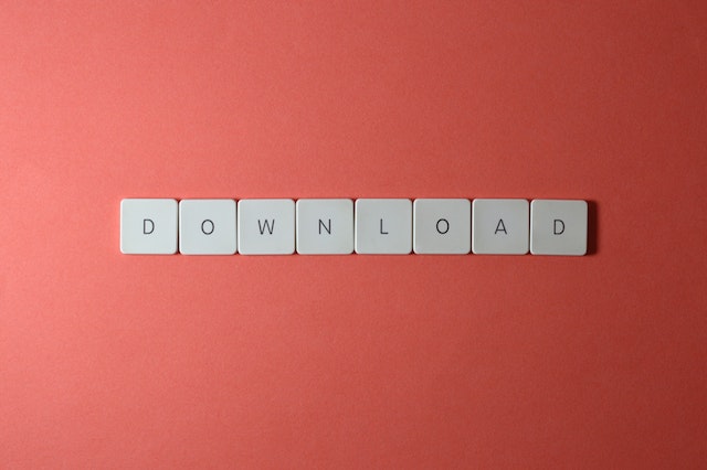 Letter tiles spell the word “DOWNLOAD.”