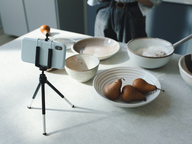 A smartphone recording a video of ingredients for a recipe.