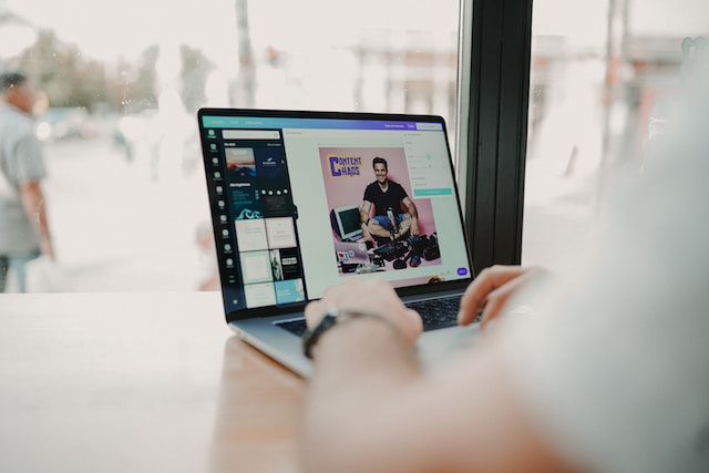 A picture of a man editing a video with an AI content creation tool.