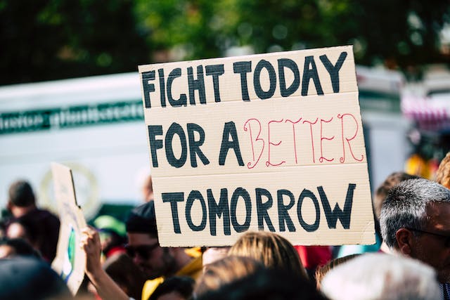 A group of people gathers for a protest. 