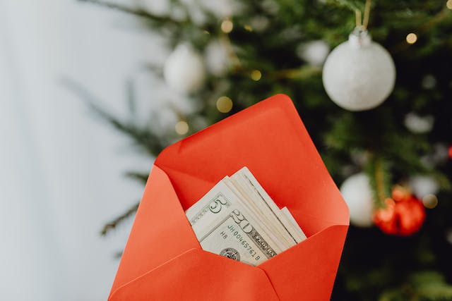 A photo of a red envelope with cash inside. 