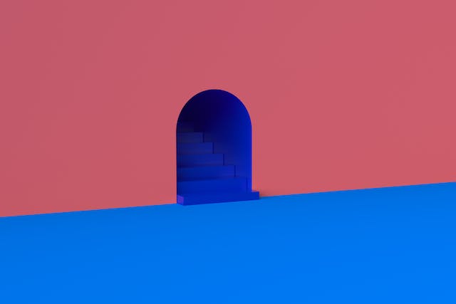 Un graphique à fort contraste montre un mur orange, un escalier bleu foncé et un sol bleu clair. 