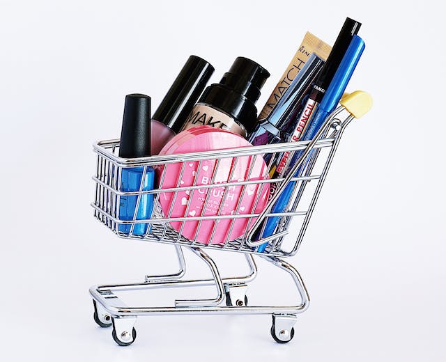 An image of a shopping cart filled with beauty products. 