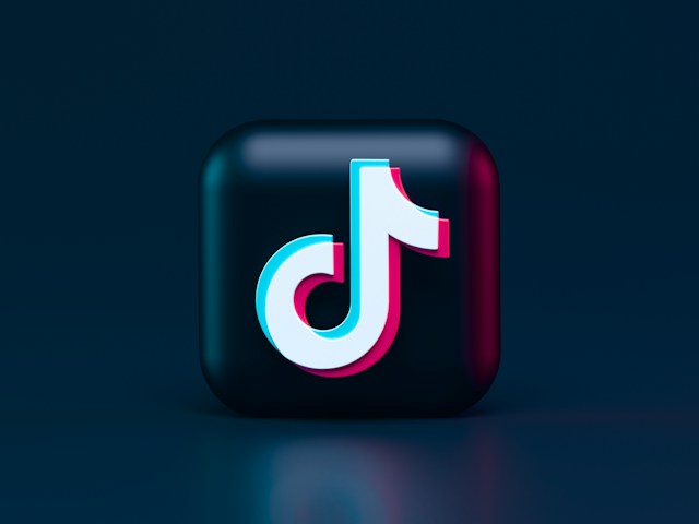 TikTok’s logo on a dark blue cube.