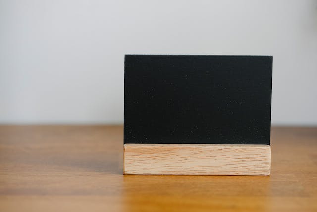 An image of a small, blank chalkboard. 